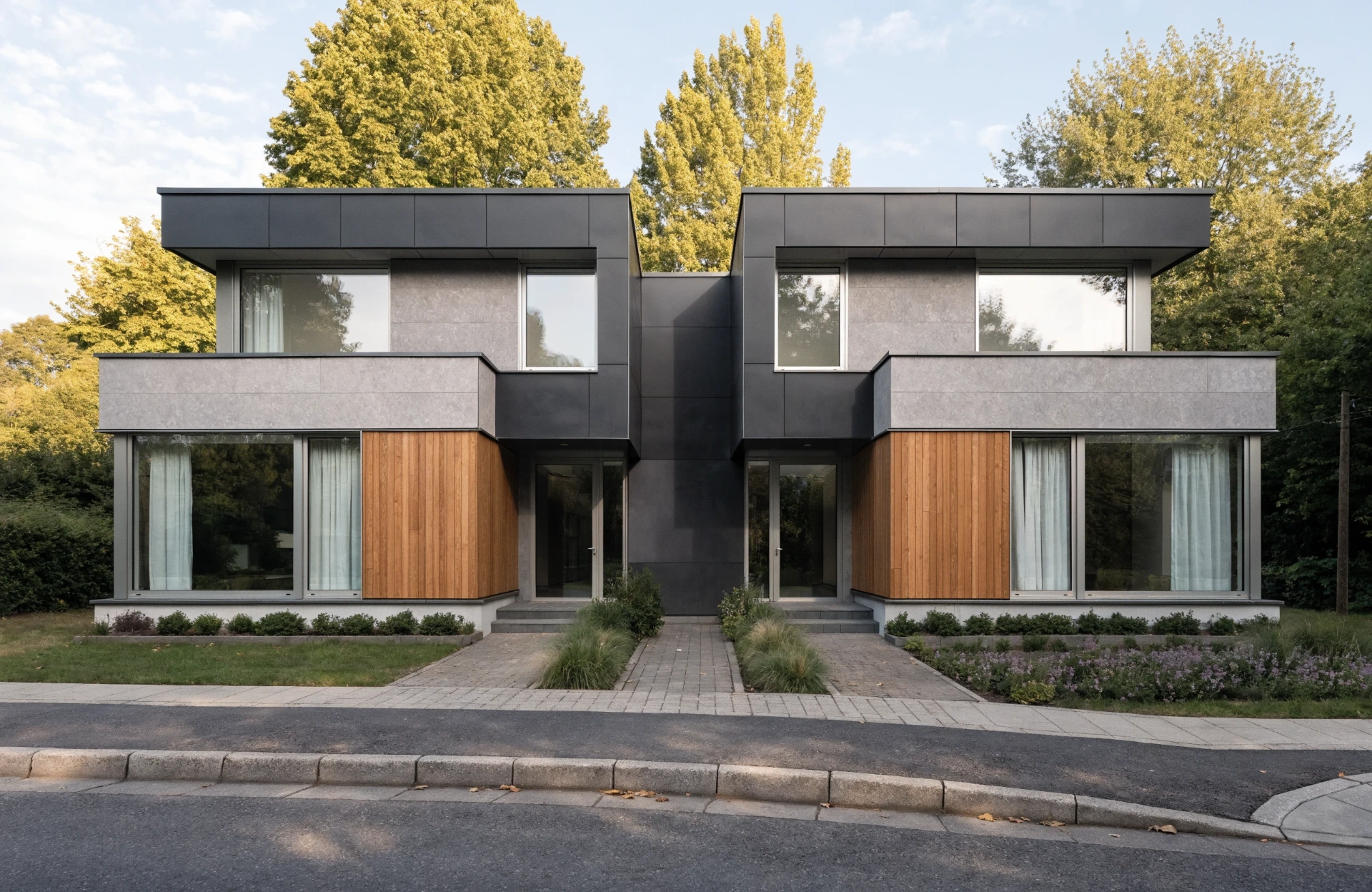 Modernes Architektenhaus mit Anthrazit-Fassade, Holzakzenten und großen Fensterflächen – exemplarisch für eine diskret vermarktete Premium-Immobilie